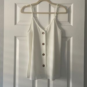 Adjustable strap button tank